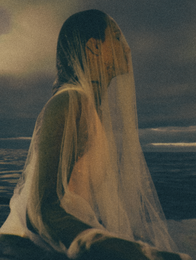 I remember thinking that the tide had stayed on her skin.