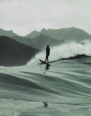 He came out of the wave like a memory.